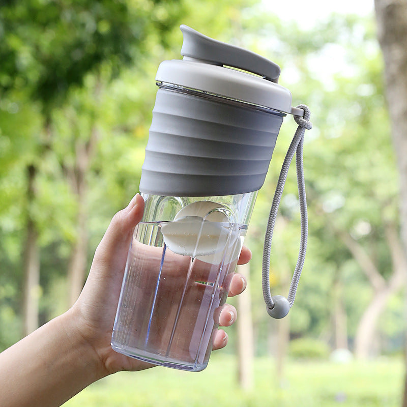 Ainmei new fitness outdoor sports water cup hand rope single-layer plastic cup milkshake shaking cup spot wholesale